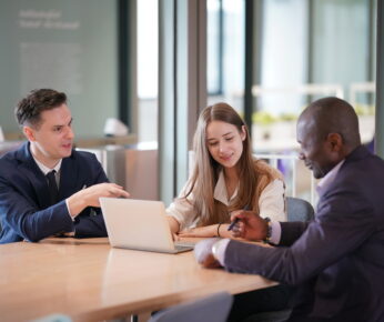 Business people in the workplace are discussing a working strategy for doing business