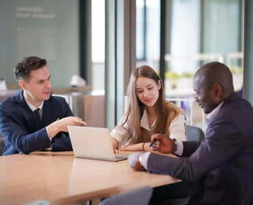 Business people in the workplace are discussing a working strategy for doing business