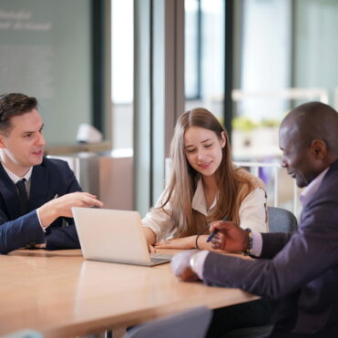 Business people in the workplace are discussing a working strategy for doing business