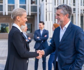 Handshake of Successful Business Executives in a Downtown Area