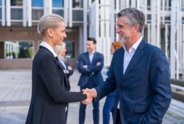 Handshake of Successful Business Executives in a Downtown Area