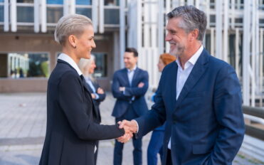Handshake of Successful Business Executives in a Downtown Area